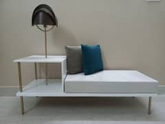 settee with table lamp