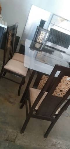 Dinning table with 6 chairs are available