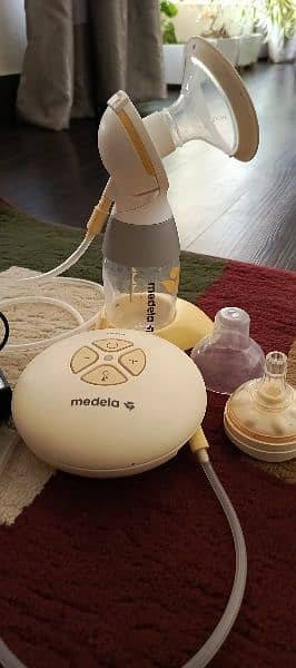 Medela Swing Branded Electric Breasts pump 8