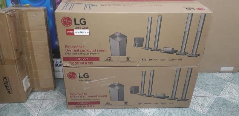 LG 5.1 HOME THEATER 65.1000 WATTS 1