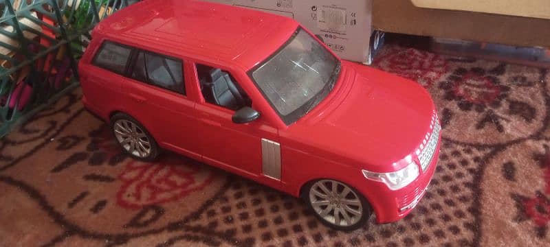 RANGE ROVER RED RC CAR WITH STEERING WHEEL CONTROLLER 3