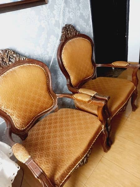 pair of wood coffee chairs with centre table 2
