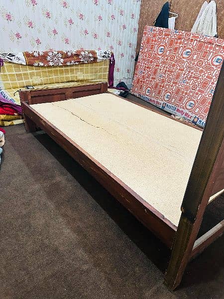 urgently Sell wooden single bed without mattress 1