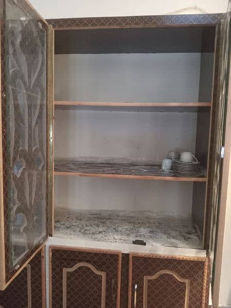 A beautiful closet for keeping heavy crockery and kitchen material. 3