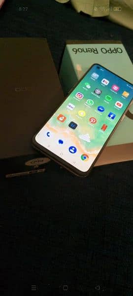 oppo reno 6 with box, very neat condition adapter and charger 1