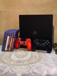 PS4 PRO 1tb with 8 games and two controllers