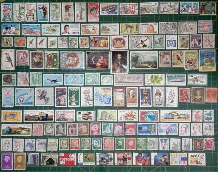 875+ Unique Used International Stamps 4