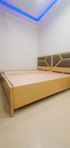 Single bed pair along with table