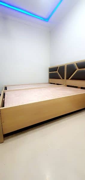 Single bed pair along with table 2