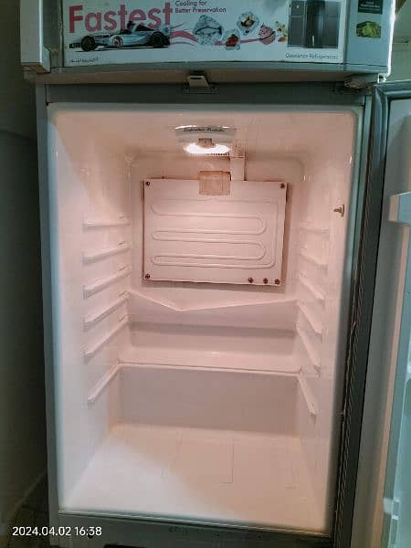 refrigerator v good condition 9.5/10 almost new 14