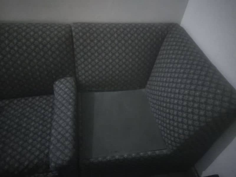 two seater sofa with two center tables. 8