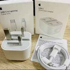 Iphone Orignal USB-C to Lightning cable and 20W Power Adapter.