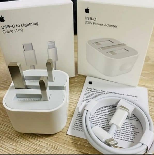 Iphone Orignal USB-C to Lightning cable and 20W Power Adapter. 0