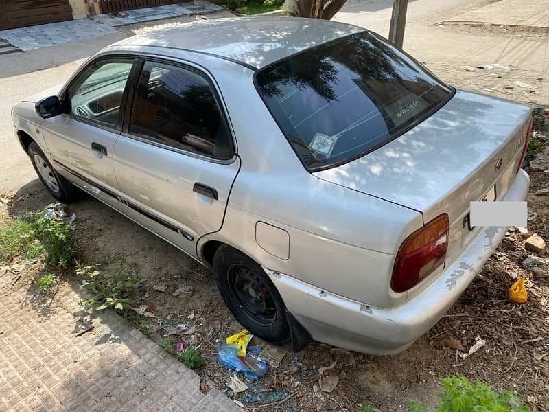 suzuki baleno 2003 silky silver 3