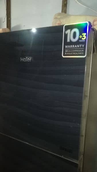 Haier fridge medium sized with 10 years warranty. no  03155443321 2