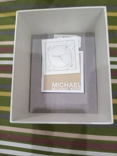 a new ladies watch MICHAEL KORS brand with additional accessories
