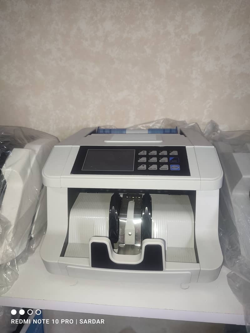 Cash counting mix note,bill packet counting machine in Pakistan No-1 9