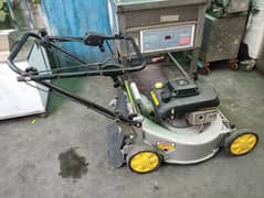lawnmower grass cutting machine petrol engine John dear USA 0