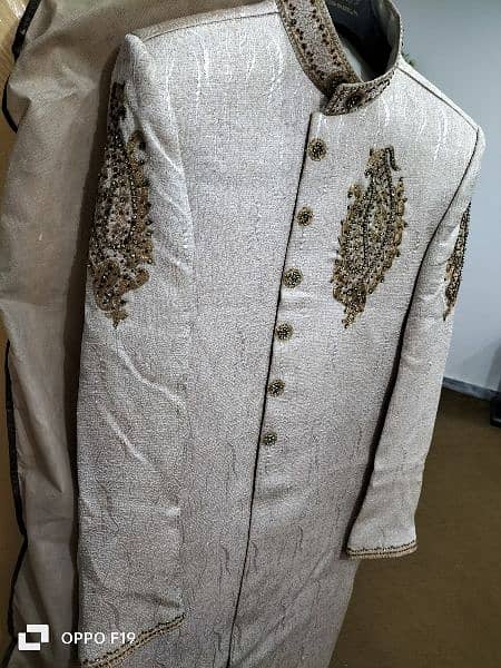 new sherwani , off-white in color 1