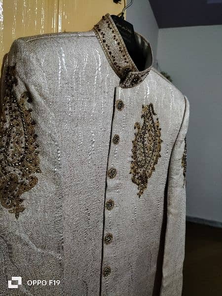 new sherwani , off-white in color 2