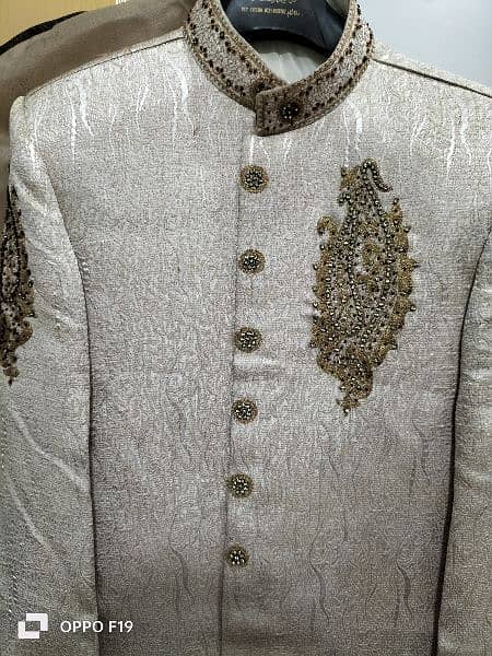 new sherwani , off-white in color 3