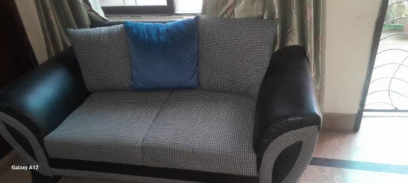 a beautiful  sofa two seater 3