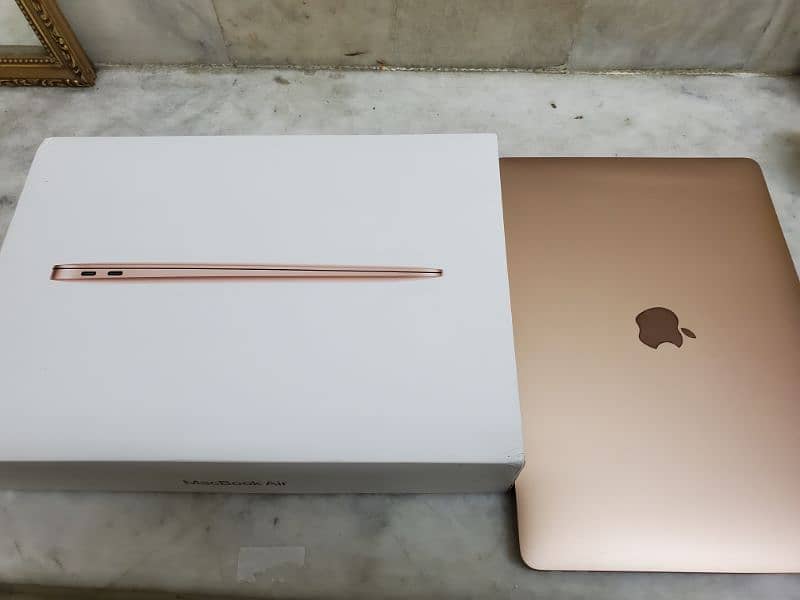 Macbook Air M1 Gold New Scratchless 10/10 Condition. 3 months Warranty 10
