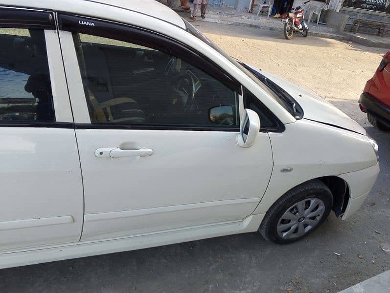 SUZUKI LIANA WHITE COLOR URGENT PAISON KI ZARORAT HAI 0