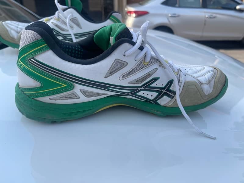 asics gel cricket spike shoes with extra rubber nails. 5