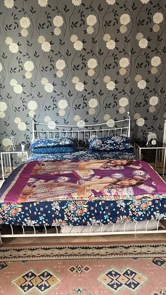 iron bed along with dressing table and 1
