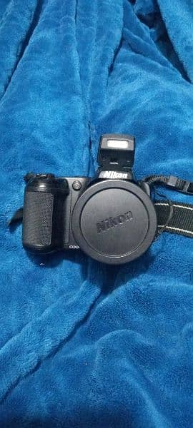 Nikon SLR  26X optical zoom Wide 0