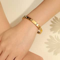 gold plated imported branded openable bracelet with  real ston