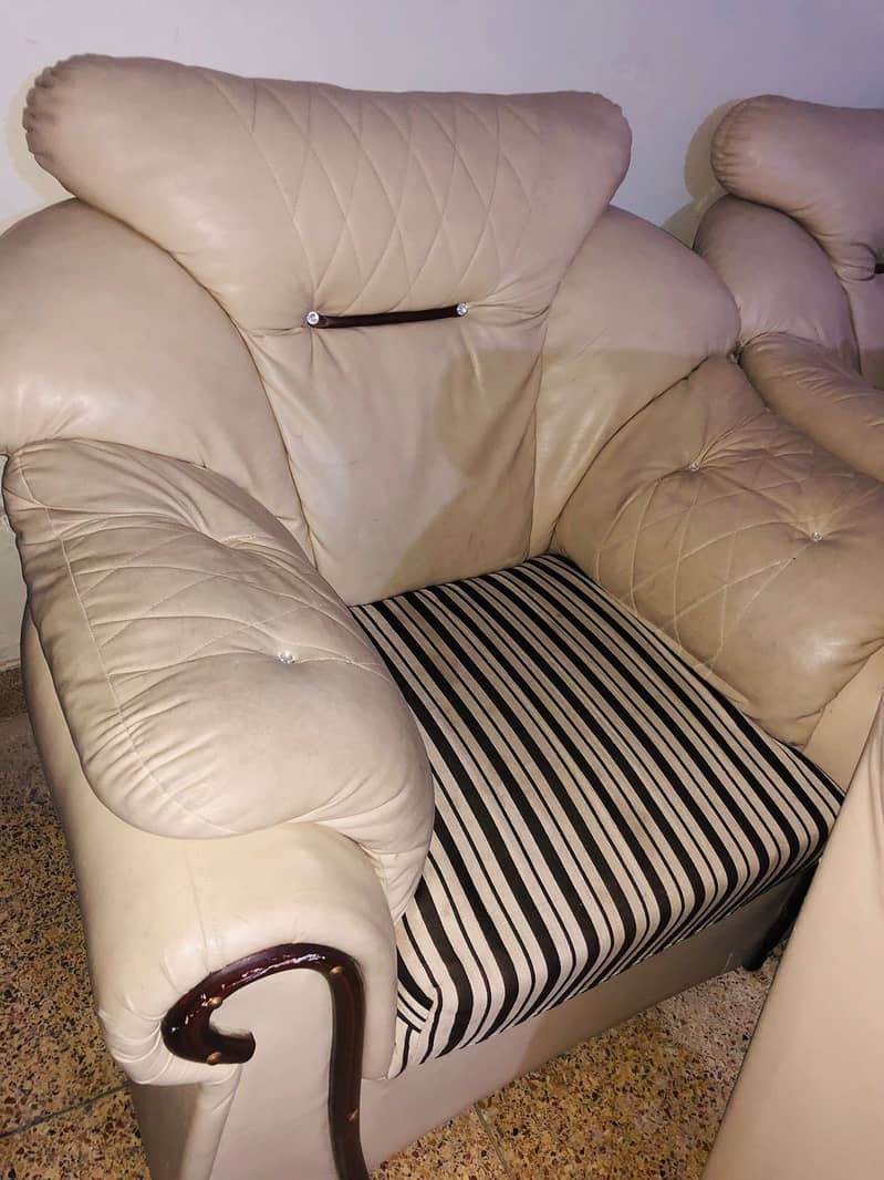 Luxurious 7-Seater Sofa Set: Leather Comfort, Stylish Fabric Seating! 5