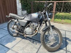 Suzuki gs150 converted into cafe racer with brand new parts sc exhaust