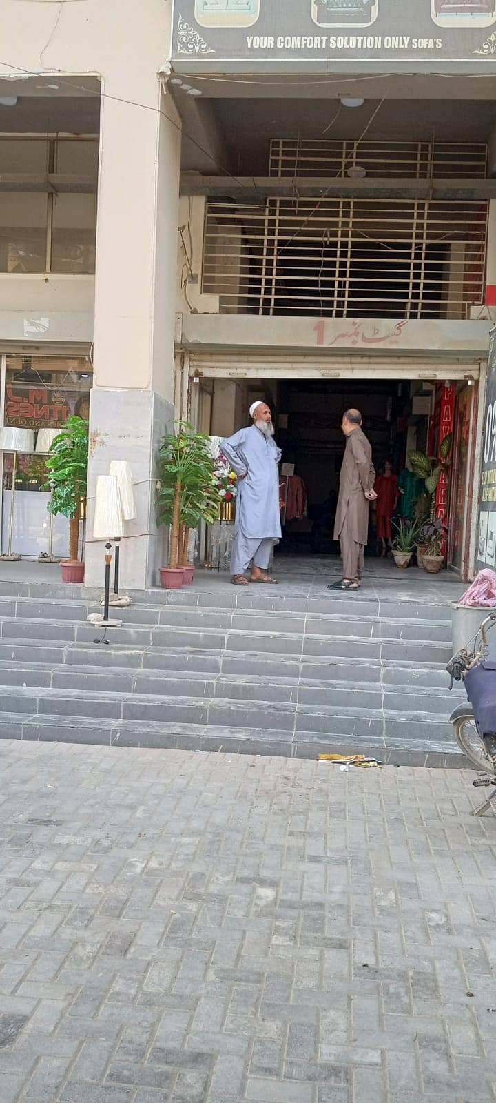 Shop Is Available For Sale in 13D, Gulshan-e-Iqbal, Karachi. 1