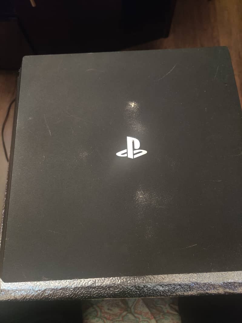 PS4 Pro 1TB With Controller and Games 1