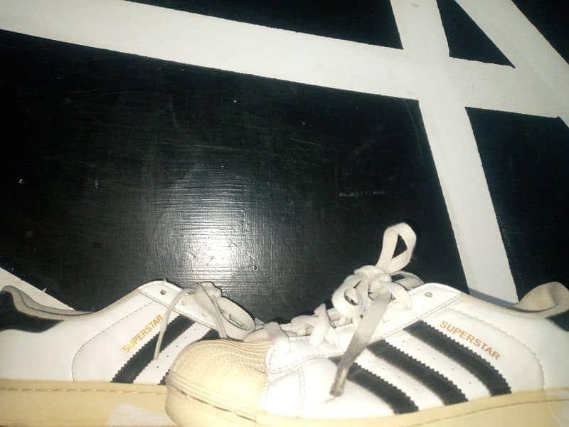 White Adidas Superstar sneakers 1