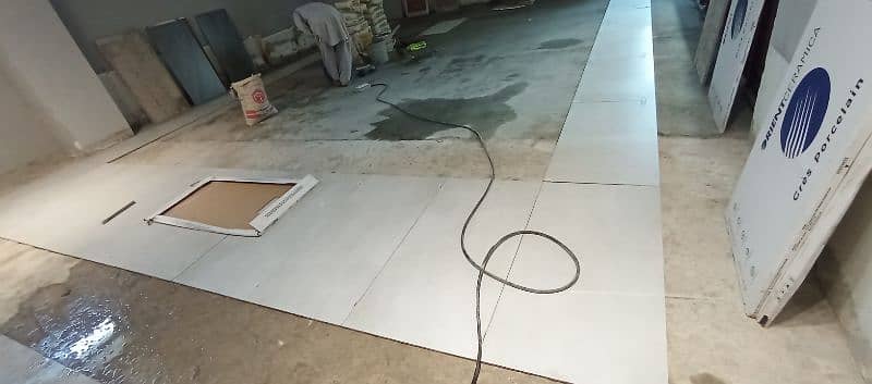 tile fixer working professional Dubai experienced 12