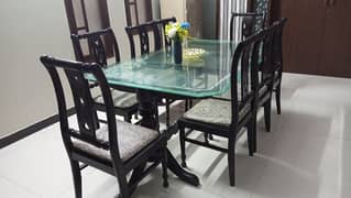 Glass wood dining table with 8 chairs like new urgent sell