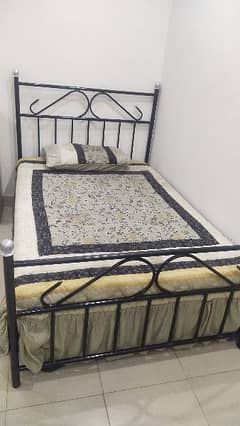 used iron bed