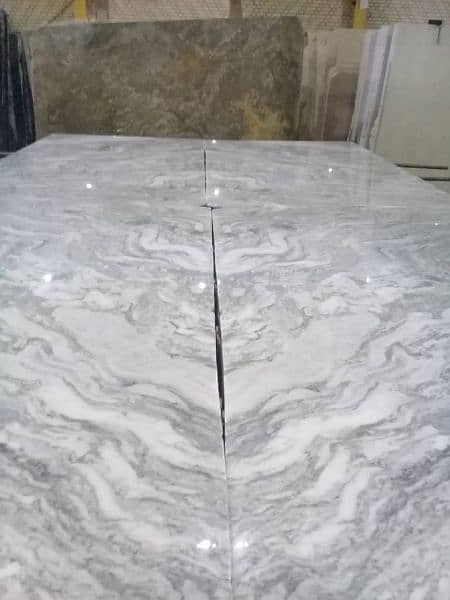 Bookmatch imported marble slabs for flooring and wall features 3