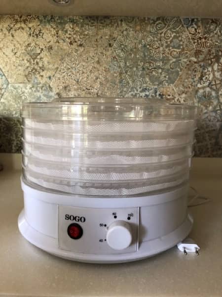 Sogo Rotary Food Dehydrator with tray liners. 0