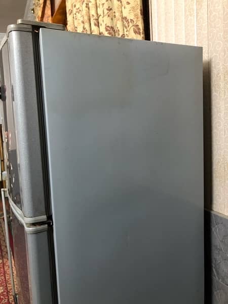 Dawlance large refrigerator with sabliser condition :used. Double door 3