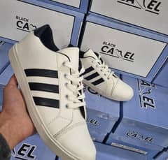 white Sneakers with black stripes comfortable and best quality