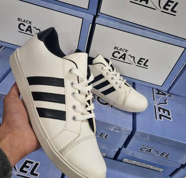 white Sneakers with black stripes comfortable and best quality 0