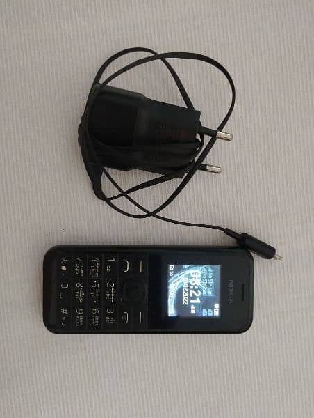 Nokia 1133 used mobile phone genuine battery and charger 0