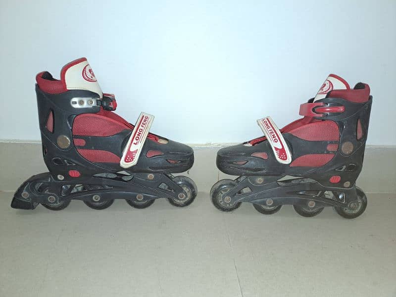 Red and black skating shoes Size 14-15 1