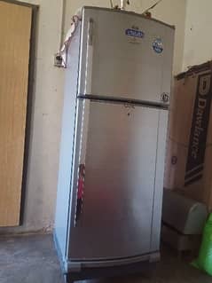Full size Dawlance refrigerator in good condition and hole sale price.