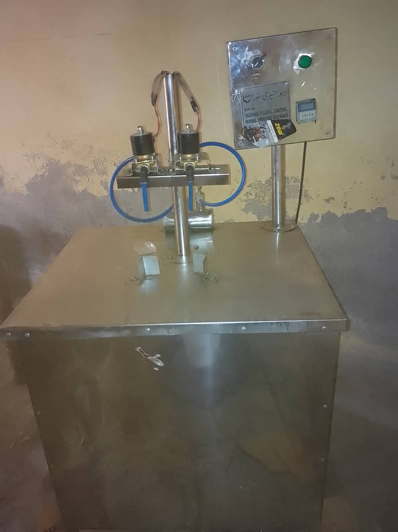 Engine oil filling and juice filling machine 0