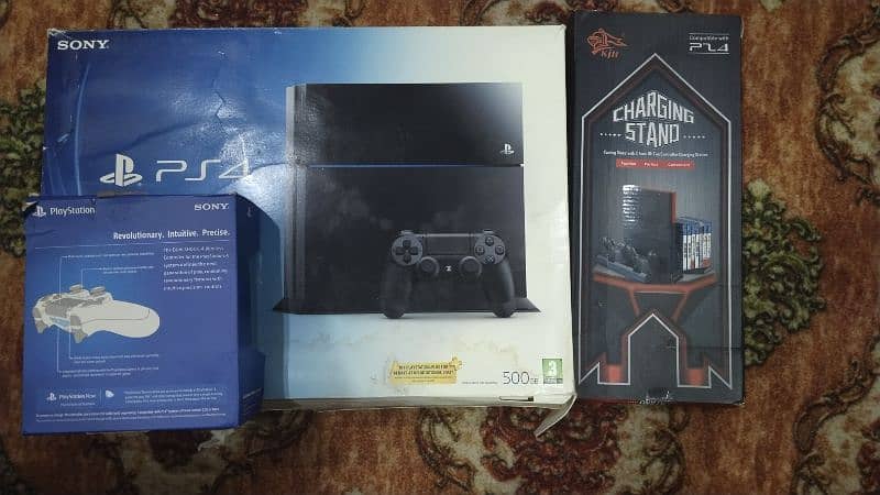 PlayStation 750 GB two controller and cooling fan 1